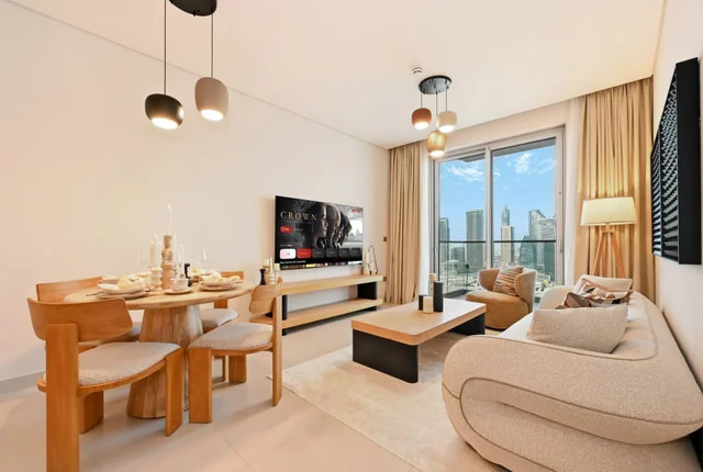 Thoughtfully furnished living and dining room at WiseStay’s Vida Dubai Mall residence